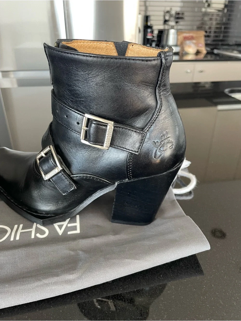 John Fluevog, black swordfish buckle/zip boot. Size 7.